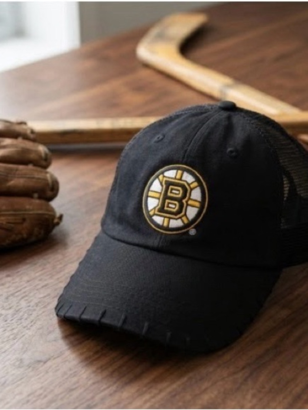 NHL Boston Bruins Black and Gold Mesh Back Trucker Hat